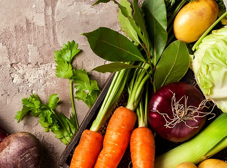 Various types of vegetables laid out on a table