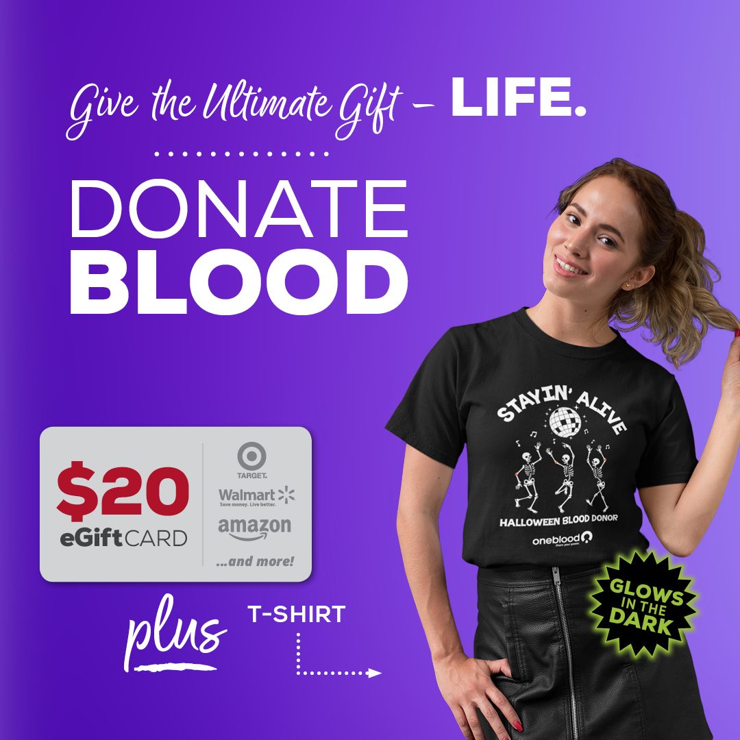 Blood donor wearing the 2024 OneBlood Halloween T-shirt, next to a Free $20 eGift Card