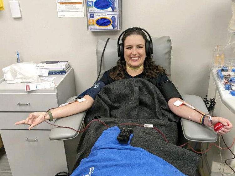 woman donating platelets at a donor center