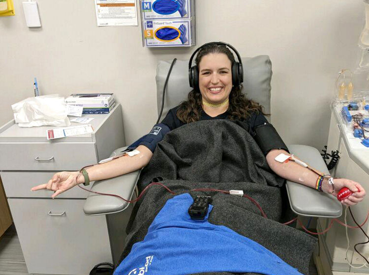 woman donating platelets at a donor center