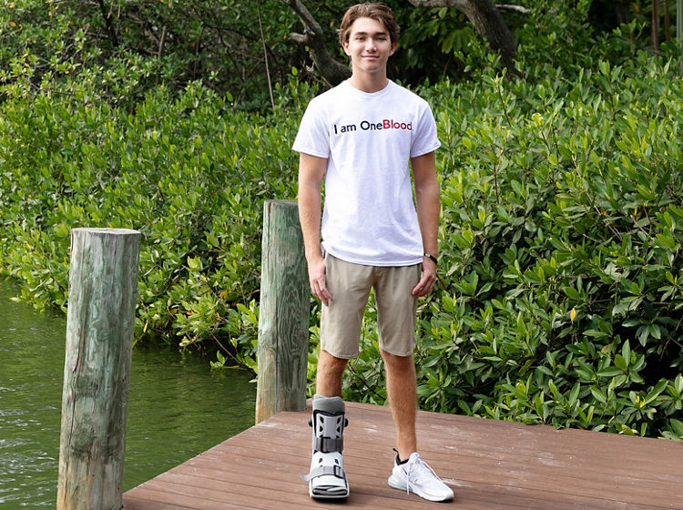 I am OneBlood Hudson standing on dock image