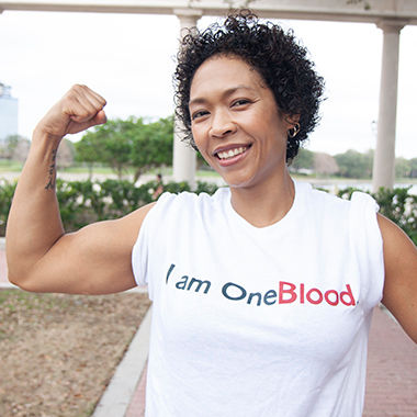 Platelet donor Louise wearing I am oneblood t-shirt