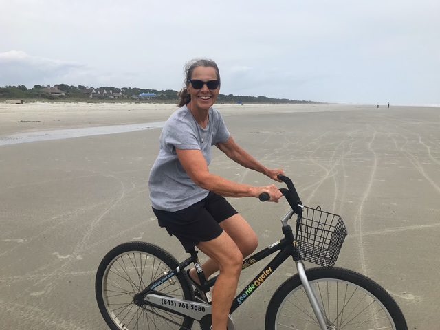 Marcia C. riding a bike image
