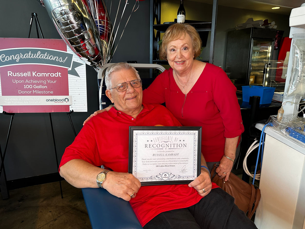 OneBlood donor, Russ, and his wife Kathy celebrating his 100-gallon donor milestone