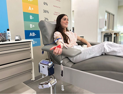 Donor donating blood at a OneBlood Donor Center