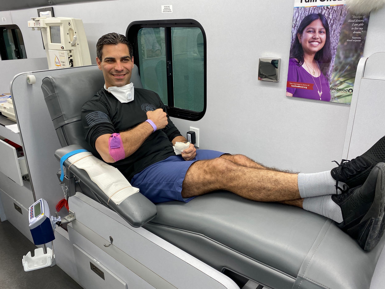 Miami Mayor Suarez donating blood on the Big Red Bus
