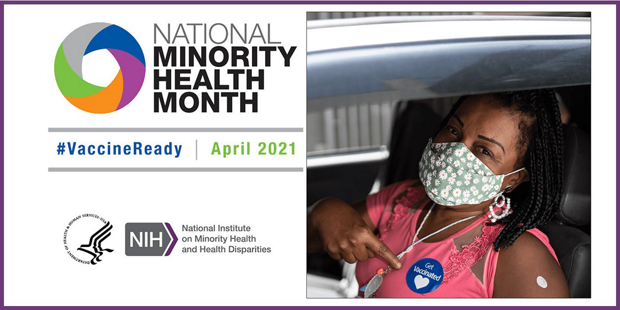 National Minority Health Month April 2021, with a woman pointing to her ‘Get Vaccinated’ sticker after getting vaccinated
