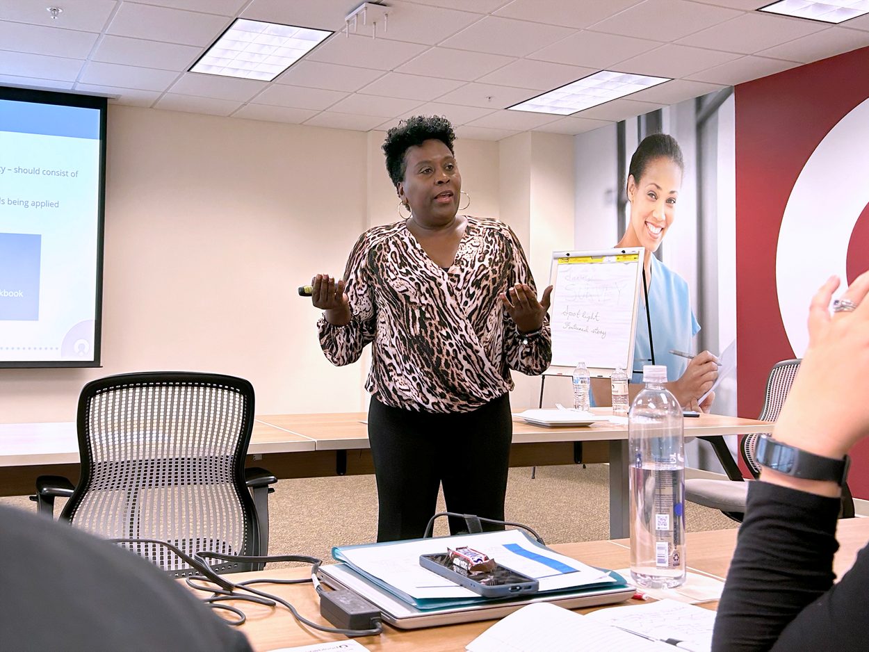 Woman instructor teaching a class